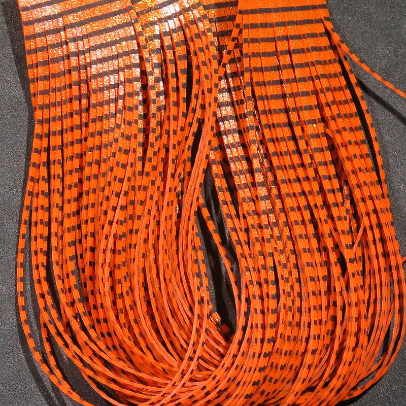 Hareline Grizzly Flutter Legs|Black Barred Orange|Black Barred Rootbeer|Black Barred Hot Yellow|Black Barred Grizzly|Black Barred Shrimp Pink|Purple Barred Hot Pink