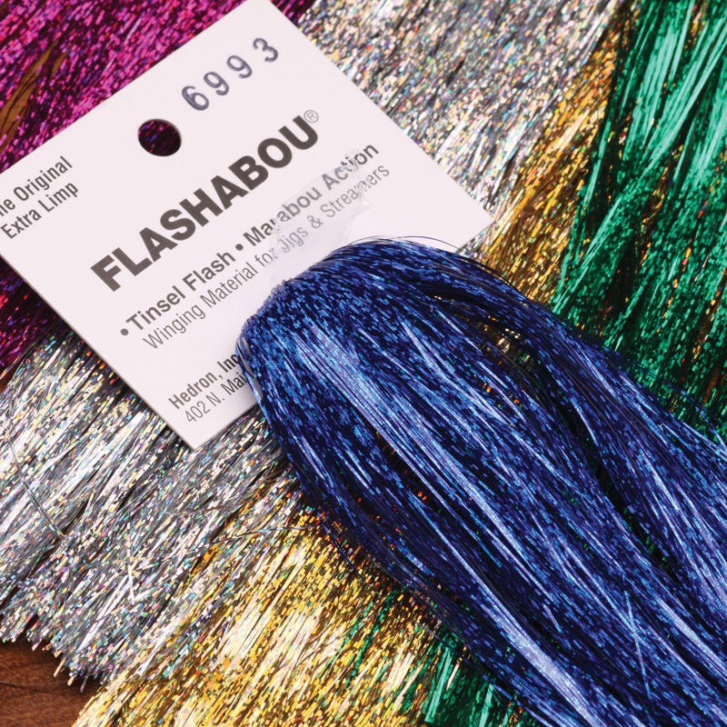 Holographic Flashabou|black 6997|blue 6993|brown 6987|chartreuse 6989|copper 6986|cranberry 6942|fire tiger 6943|fuchsia 6995|gold 6992|green 6994|lt. purple 6977|moonlight 6946|orange 6941|perch 6978|pink 6988|purple 6999|brt. rainbow 6979|rainbow 6998|r