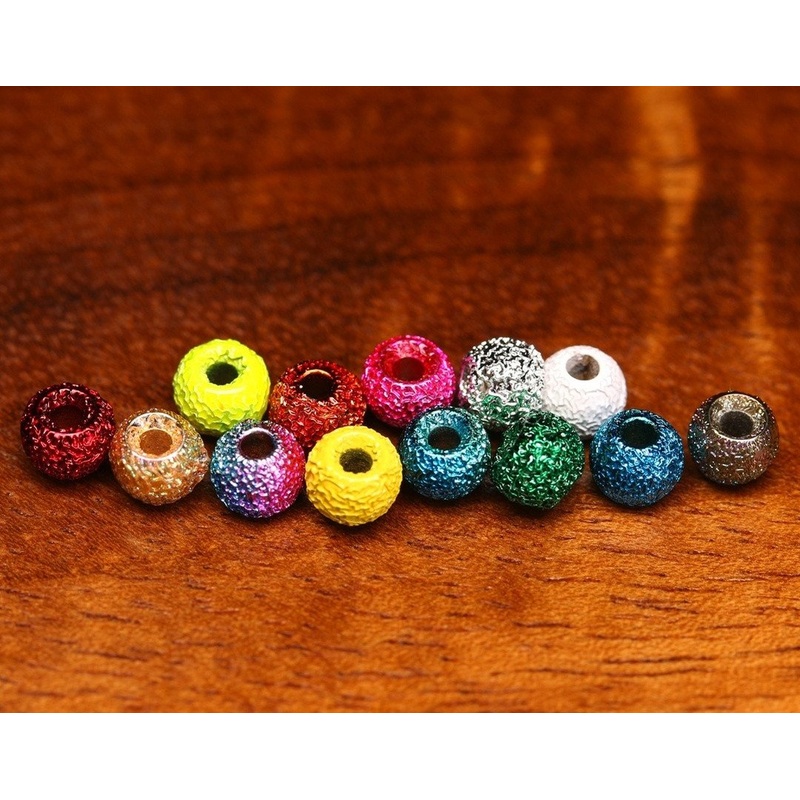 Hareline Gritty Tungsten Bead||153 Gold Grit||165 Gray Grit||23 Blue Grit||271 Orange Grit||263 Peacock Grit||289 Pink grit||306 Rainbow Grit||310 Red Grit|1/8 3.3mm|3/16″ 4.6mm|3/32 2.3mm|5/32 3.8mm|7/32″ 5.5mm|7/64 2.8mm
